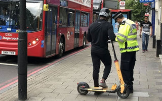 How do you safely ride an electric scooter?