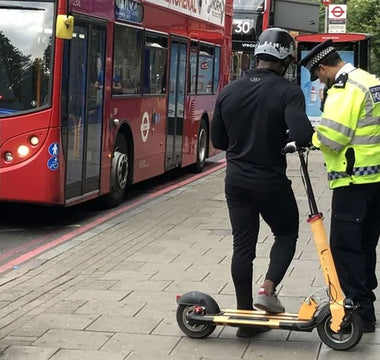 How do you safely ride an electric scooter?